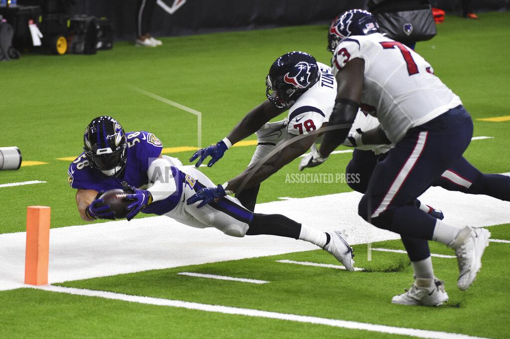 Eric Christian Smith Baltimore Ravens linebacker L.J. Fort (58) scores a touchdown on a fumble recovery past Houston Texans offensive tackle Laremy Tunsil (78) and offensive guard Zach Fulton (73) during the first half of an NFL football game Sunday, Sept. 20, 2020, in Houston. (AP Photo/Eric Christian Smith)