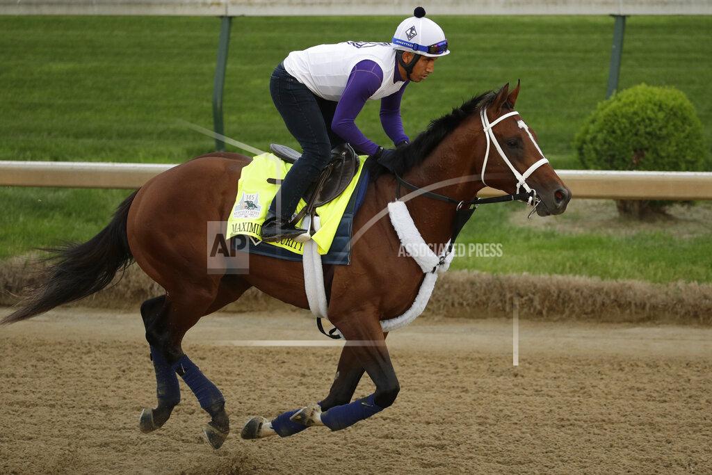 Charlie Riedel Kentucky Derby entrant Maximum Security is ridden during a workout at Churchill Downs Wednesday, May 1, 2019, in Louisville, Ky. The 145th running of the Kentucky Derby is scheduled for Saturday, May 4. (AP Photo/Charlie Riedel)