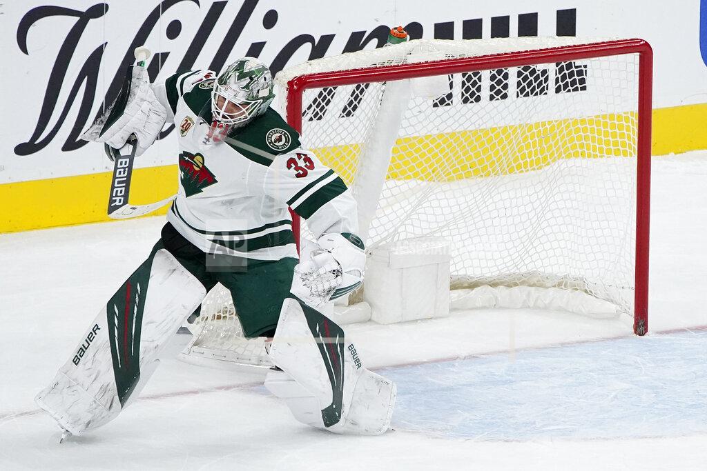 John Locher Minnesota Wild goaltender Cam Talbot (33) celebrates after the Minnesota Wild defeated the Vegas Golden Knights in a shootout at an NHL hockey game Thursday, April 1, 2021, in Las Vegas. (AP Photo/John Locher)