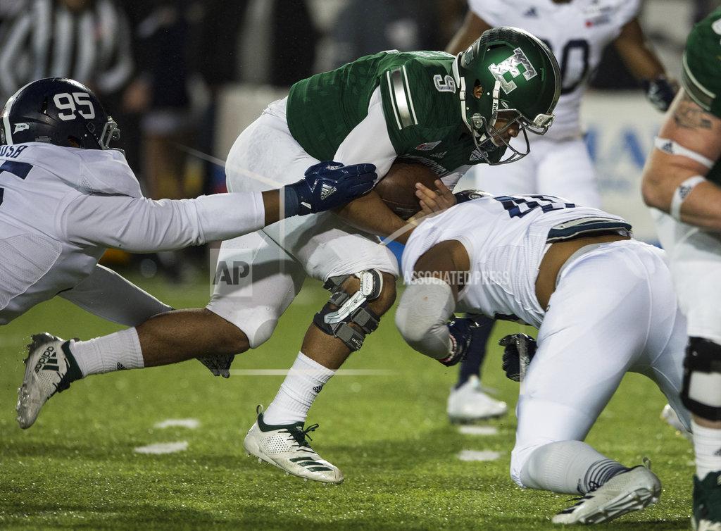 Jake Crandall Eastern Michigan quarterback Mike Glass, III, (9) runs the ball against Georgia Southern during the Camellia Bowl NCAA college football game in Montgomery, Ala., on Saturday, Dec. 15, 2018. (Jake Crandall/The Montgomery Advertiser via AP)