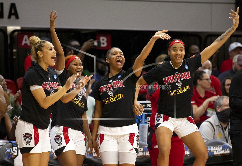 Ben Mckeown The North Carolina State bench reacts to a play during the second half of a college basketball game against Longwood in the first round of the NCAA tournament in Raleigh, N.C., Saturday, March 19, 2022. (AP Photo/Ben McKeown)