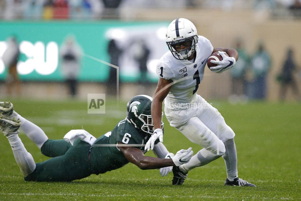 Al Goldis Penn State receiver KJ Hamler, right, eludes Michigan State's David Dowell (6) during the second quarter of an NCAA college football game, Saturday, Oct. 26, 2019, in East Lansing, Mich. (AP Photo/Al Goldis)