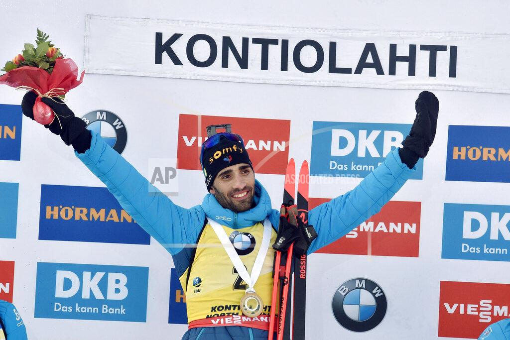 Jussi Nukari Martin Fourcade of France celebrates victory in his final competition, after winning the men's 12.5 km Pursuit competition at the IBU Biathlon World Cup in Kontiolahti, Finland, Saturday March 14, 2020. Fourcade retired from the sport on Saturday exactly ten years after his first World Cup victory in Kontiolahti. (Jussi Nukari/Lehtikuva via AP)