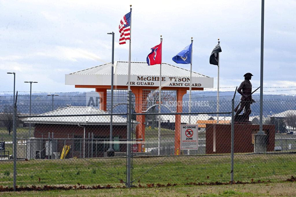 The entrance to McGhee Tyson Air National Guard Base is locked down Wednesday, Jan. 15, 2020, after reports were received of shots being fired at the facility in Alcoa, Tenn. (AP Photo/Michael Patrick)