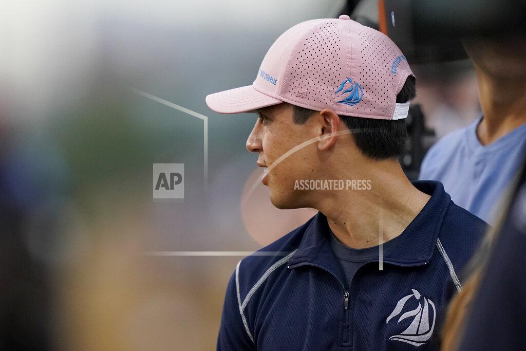 Charlie Riedel Patrick O'Neill watches Kentucky Derby entrant Hot Rod Charlie work out at Churchill Downs Wednesday, April 28, 2021, in Louisville, Ky. O'Neill along with four friends from college own 25% of the horse being trained by O'Neill's uncle Doug O'Neill. (AP Photo/Charlie Riedel)