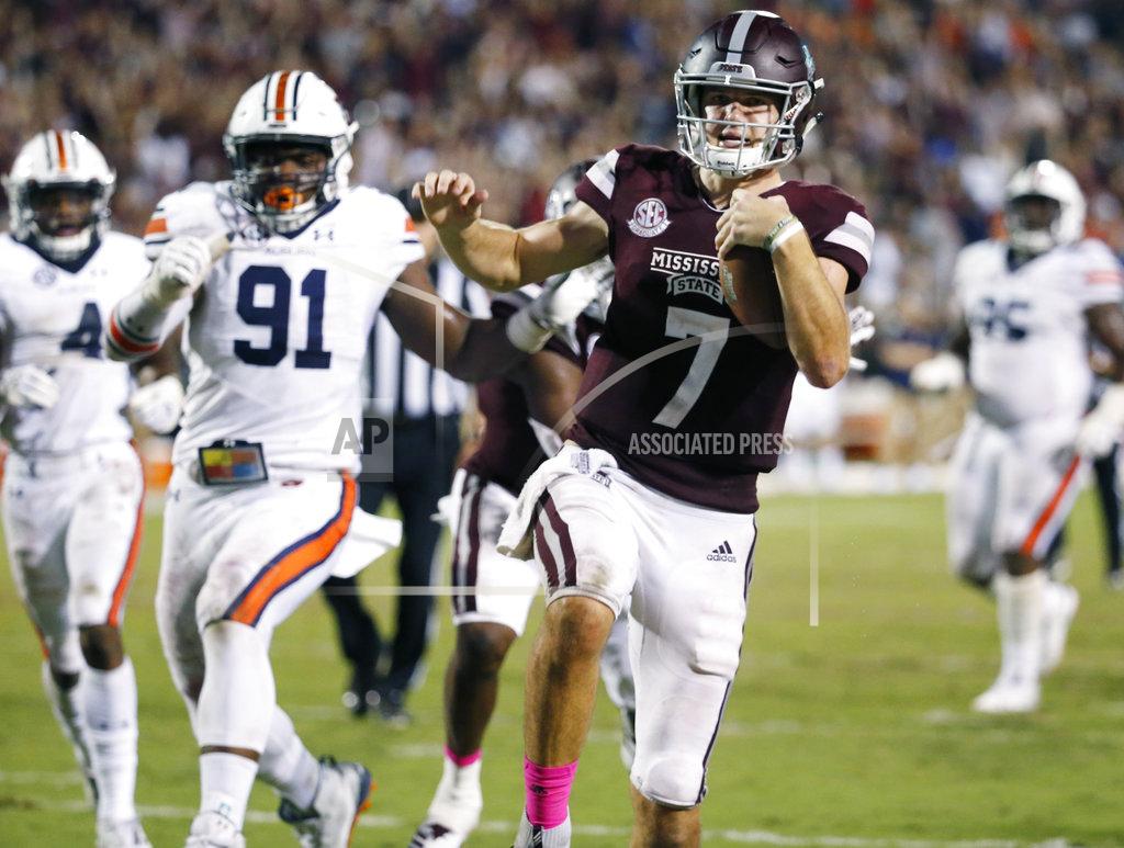 Rogelio V. Solis Mississippi State quarterback Nick Fitzgerald (7) leaps into the end zone with a touchdown during the second half of an NCAA college football game against Auburn in Starkville, Miss., Saturday, Oct. 6, 2018. Mississippi State won 23-9. (AP Photo/Rogelio V. Solis)