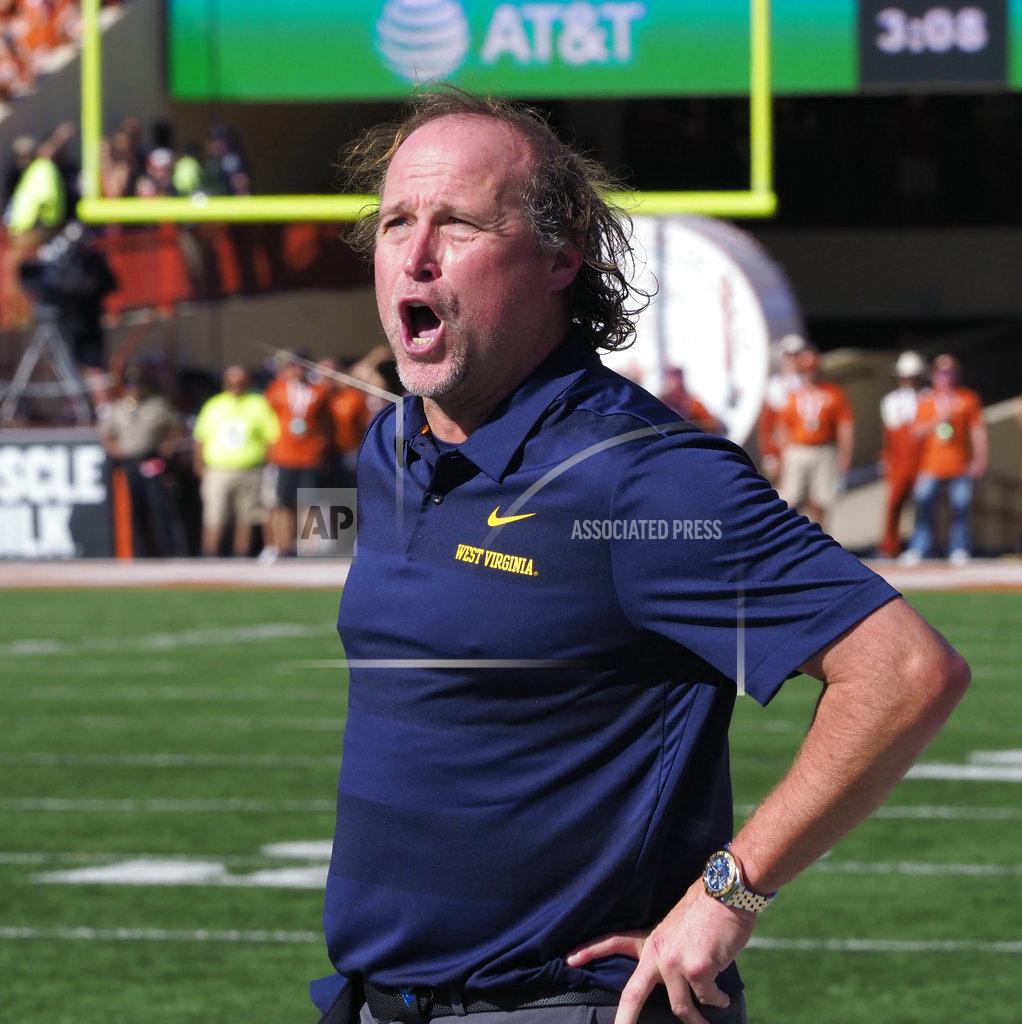 Michael Thomas West Virginia head coach Dana Holgorsen shows his emotion after his team was penalized during the first half of an NCAA college football game against Texas, Saturday, Nov. 3, 2018, in Austin, Texas. (AP Photo/Michael Thomas)