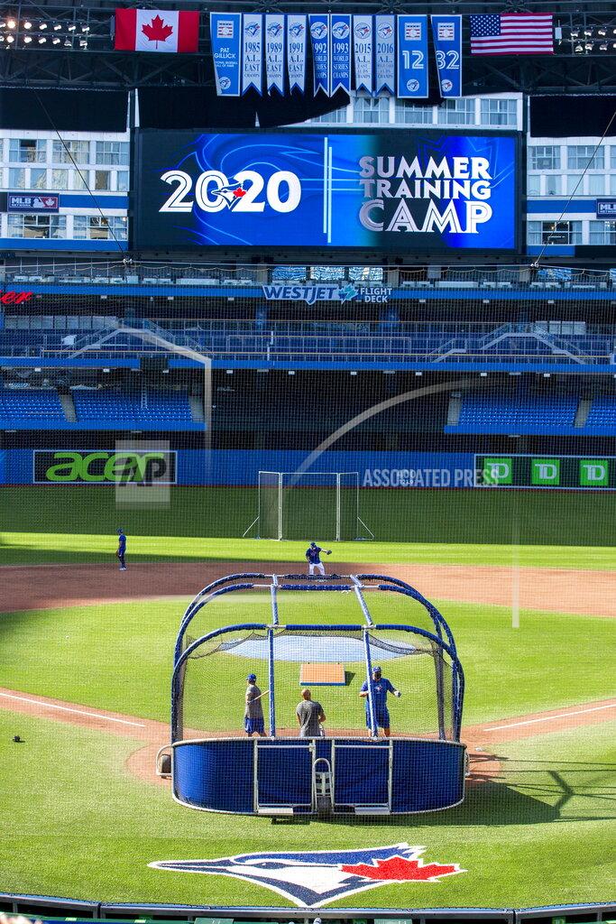 Carlos Osorio The Toronto Blue Jays take batting practice before the baseball team's intrasquad game in Toronto on Thursday, July 9, 2020. (Carlos Osorio/The Canadian Press via AP)
