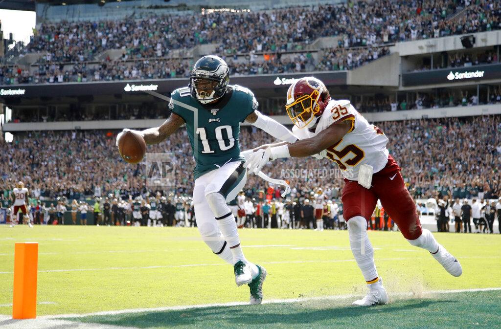 Matt Rourke FILE - In this Sept. 8, 2019, file photo, Philadelphia Eagles' DeSean Jackson, left, scores a touchdown against Washington Redskins' Montae Nicholson during the second half of an NFL football game in Philadelphia. Jackson is hoping to show what he can do for the Eagles even at age 33. With a couple of other wide receivers banged up, he might get that chance in the season opener Sunday at Washington. Jackson played for Washington from 2014-16 and put up 1,000 yards receiving in two of those seasons. (AP Photo/Matt Rourke, File)