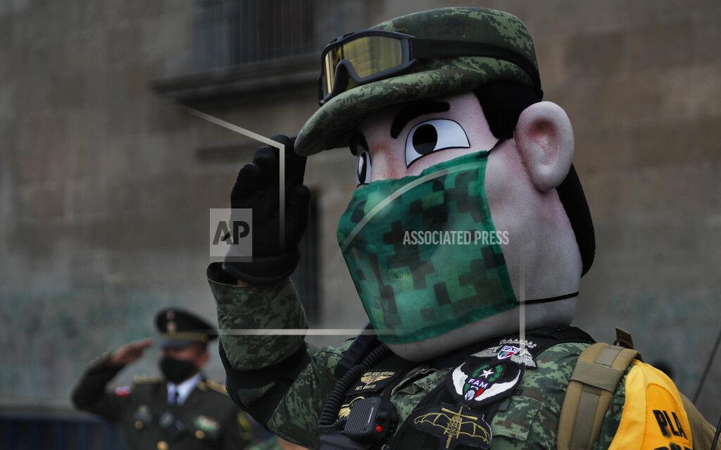 Marco Ugarte An army mascot salutes during the annual Independence Day military parade in Mexico City's main square of the capital, the Zócalo, Wednesday, Sept. 16, 2020. Mexico celebrates the anniversary of its independence uprising of 1810. (AP Photo/Marco Ugarte)