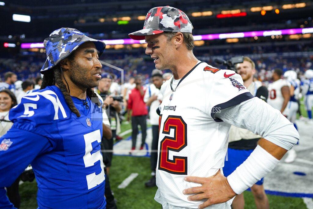 Aj Mast Tampa Bay Buccaneers quarterback Tom Brady (12) talks with Indianapolis Colts cornerback Stephon Gilmore (5) after an NFL preseason football game in Indianapolis, Saturday, Aug. 27, 2022. The Colts defeated the Buccaneers 27-10. (AP Photo/AJ Mast)