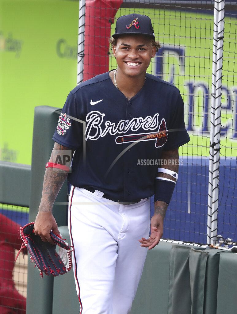 Curtis Compton Atlanta Braves outfielder Cristian Pache is all smiles arriving for spring training baseball batting practice in North Port, Fla., Wednesday, Feb. 24, 2021. (Curtis Compton/Atlanta Journal-Constitution via AP)