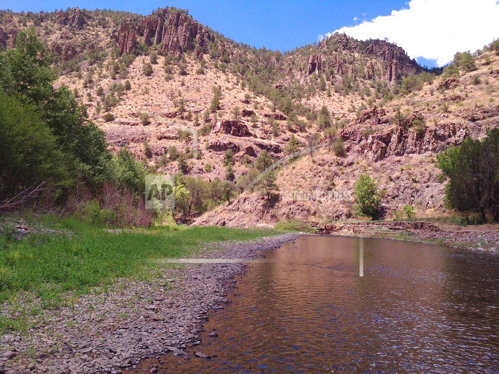Nathan Newcomer This undated photo provided by Nathan Newcomer shows the Gila River within the Gila Wilderness in southwest New Mexico. Portions of the Gila River would be designated as “wild and scenic” under legislation unveiled Tuesday, May 12, 2020, by New Mexico Sens. Tom Udall and Martin Heinrich. The measure would cover parts of the Gila River, San Francisco River and numerous creeks. (Nathan Newcomer via AP)
