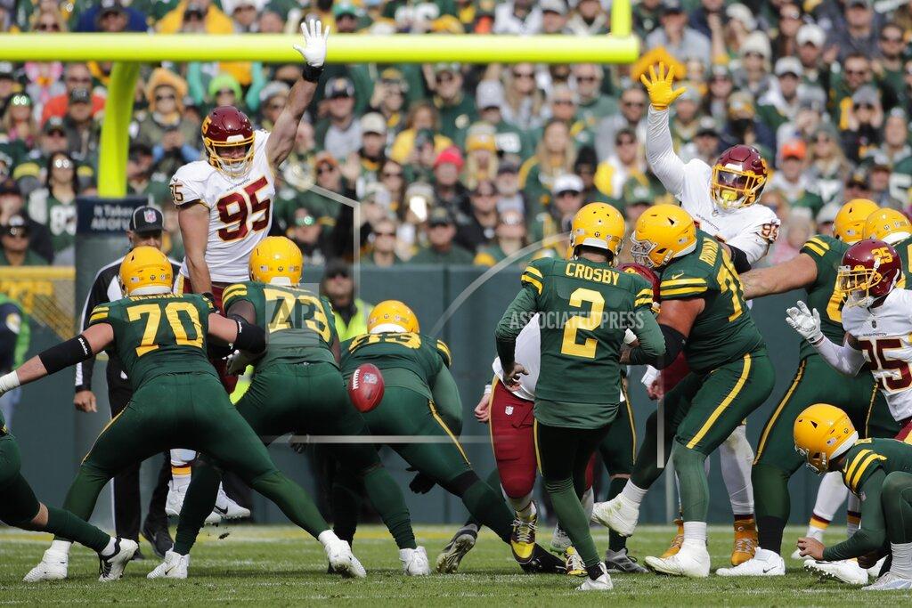Aaron Gash Green Bay Packers' Mason Crosby has a field goal attempt blocks during the first half of an NFL football game Sunday, Oct. 24, 2021, in Green Bay, Wis. (AP Photo/Aaron Gash)
