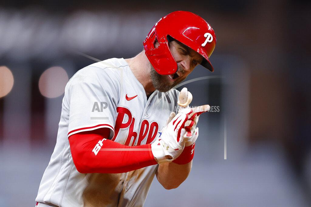 Todd Kirkland Philadelphia Phillies Bryce Harper reacts after hitting a two run home run in the ninth inning of a baseball game against the Atlanta Braves, Tuesday, May 24, 2022, in Atlanta. (AP Photo/Todd Kirkland)