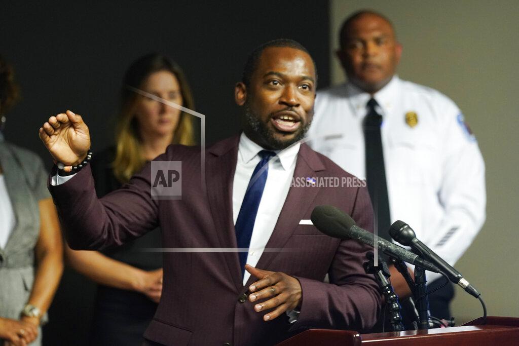 Steve Helber Richmond Mayor Levar Stoney, left, gestures while Police Chief Gerald M Smith, right, listens during a press conference at Richmond Virginia Police headquarters, Wednesday, July 6, 2022, in Richmond, Va. Police said Wednesday that they thwarted a planned July 4 mass shooting after receiving a tip that led to arrests and the seizure of multiple guns — an announcement that came just two days after a deadly mass shooting on the holiday in a Chicago suburb. (AP Photo/Steve Helber)