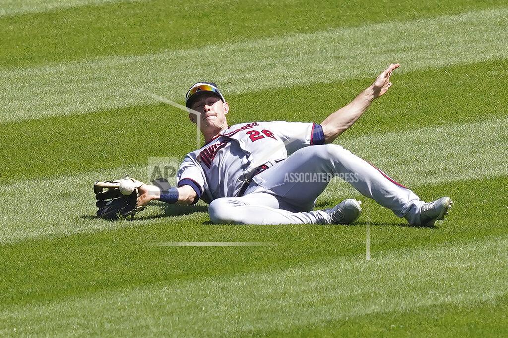 Charles Rex Arbogast Minnesota Twins' Max Kepler is unable to catch a broken bat fly ball from Chicago White Sox's Yoan Moncada during the third inning of a baseball game Thursday, May 13, 2021, in Chicago. (AP Photo/Charles Rex Arbogast)