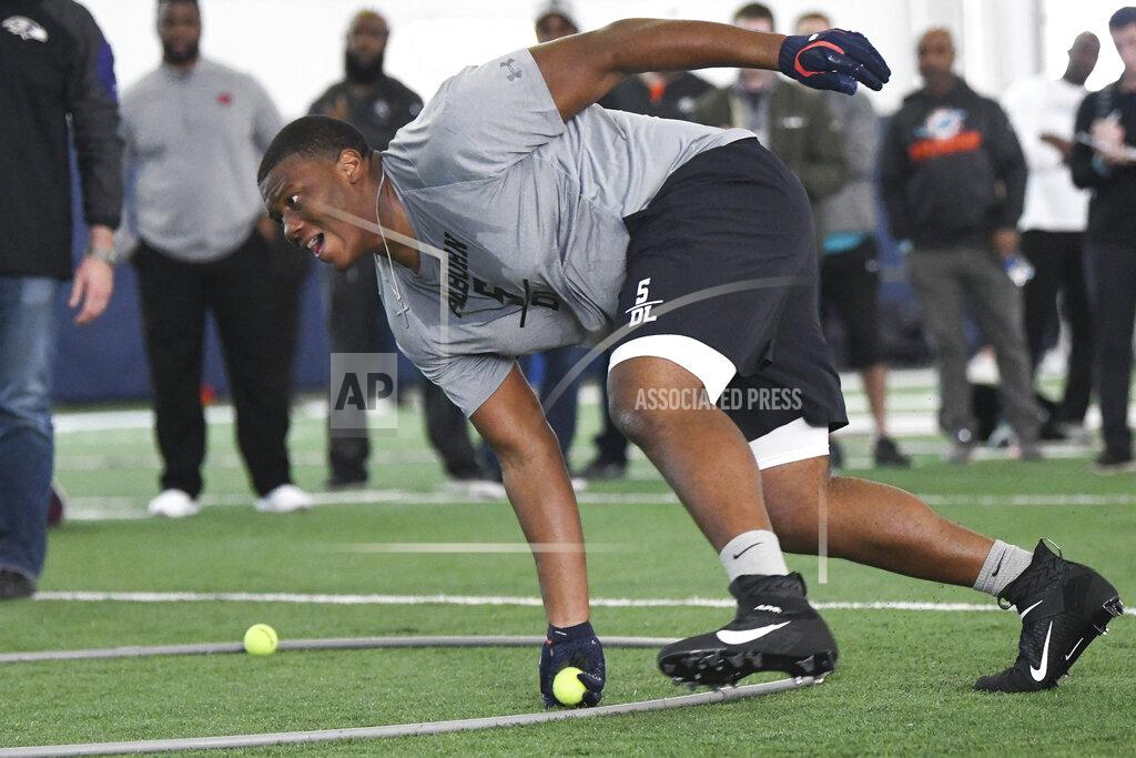 Julie Bennett Defensive tackle Derrick Brown runs through defensive drills during Auburn NCAA college football Pro Day, Friday, March 6, 2020, in Auburn, Ala. (AP Photo/Julie Bennett)