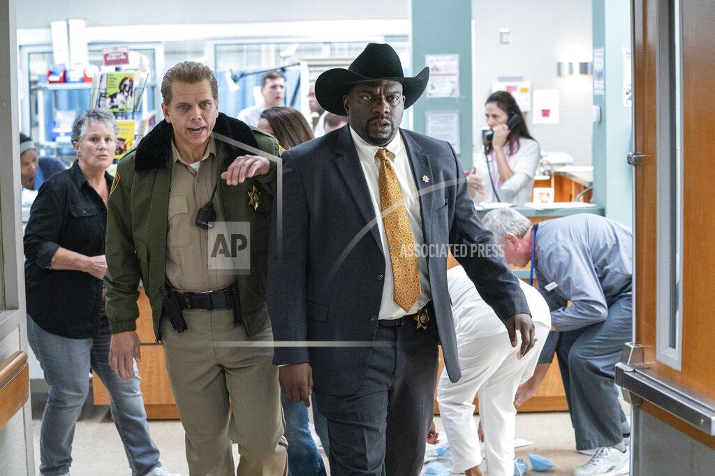 Ryan Green This image released by Universal Pictures shows Brian F. Durkin, left, and Omar Dorsey in "Halloween Kills," directed by David Gordon Green. (Ryan Green/Universal Pictures via AP)