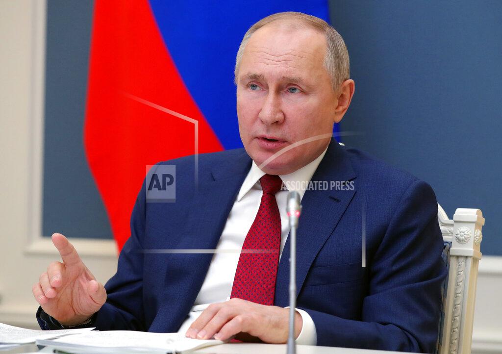 Mikhail Klimentyev Russian President Vladimir Putin speaks to participants of the the World Economic Forum via a video link in Moscow, Russia, Wednesday, Jan. 27, 2021. Putin warned of rising global tensions and growing risks of new conflicts and called for broader international cooperation to tackle new challenges. (Mikhail Klimentyev, Sputnik, Kremlin Pool Photo via AP)