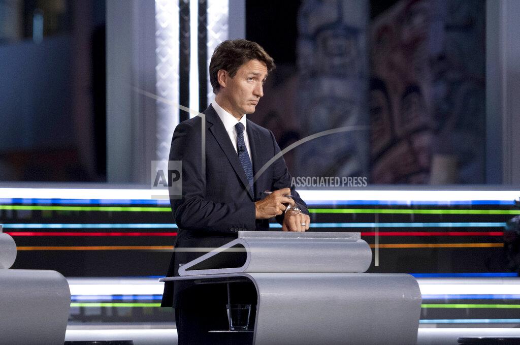 Justin Tang Liberal leader Justin Trudeau waits to begin the federal election French-language leaders debate, Wednesday, Sept. 8, 2021, in Gatineau, Quebec. (Adrian Wyld/The Canadian Press via AP)