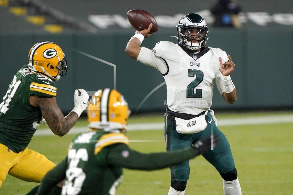 Morry Gash Philadelphia Eagles' Jalen Hurts throws during the second half of an NFL football game against the Green Bay Packers Sunday, Dec. 6, 2020, in Green Bay, Wis. (AP Photo/Morry Gash)