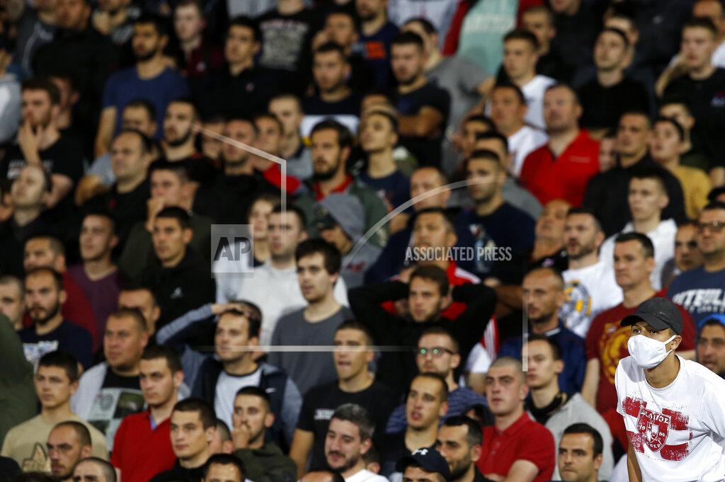 Darko Vojinovic Red Star fans watch the Serbian National Cup semi final soccer match between Partizan and Red Star in Belgrade, Serbia, Wednesday, June 10, 2020. (AP Photo/Darko Vojinovic)