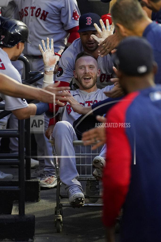 Charles Rex Arbogast Boston Red Sox's Trevor Story celebrates in the dugout after his home run off Chicago White Sox starting pitcher Dallas Keuchel during the second inning of a baseball game Thursday, May 26, 2022, in Chicago. (AP Photo/Charles Rex Arbogast)
