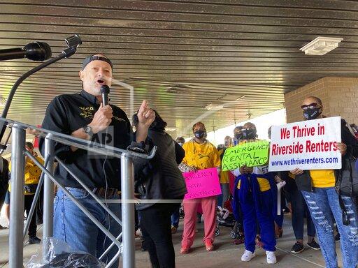 FILE - Bruce Marks, CEO of the Neighborhood Assistance Corporation of America, speaks at a rally on Tuesday, Nov. 16, 2021 in Atlanta demanding Georgia officials speed up the distribution of rental assistance. Georgia officials struggling to distribute federal funds to prevent evictions have outlined plans to increase the speed at which they get the money to landlords and renters. The improvement plans were submitted last week to the U.S. Department of the Treasury. (AP Photo/Sudhin Thanawala, File)