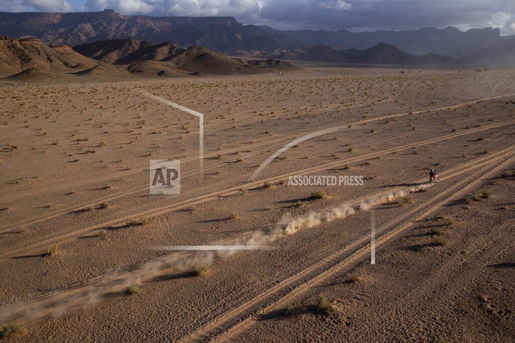 Bernat Armangue Sam Sunderland of Great Britain rides his KTM motorbike during stage four of the Dakar Rally between Neom and Al Ula, in Saudi Arabia, Wednesday, Jan. 8, 2020. (AP Photo/Bernat Armangue)