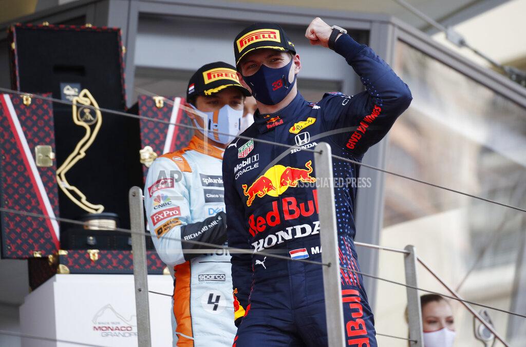 Sebastien Nogier Red Bull driver Max Verstappen of the Netherlands celebrates after winning the Monaco Grand Prix at the Monaco racetrack, in Monaco, Sunday, May 23, 2021. (Sebastien Nogier, Pool via AP)