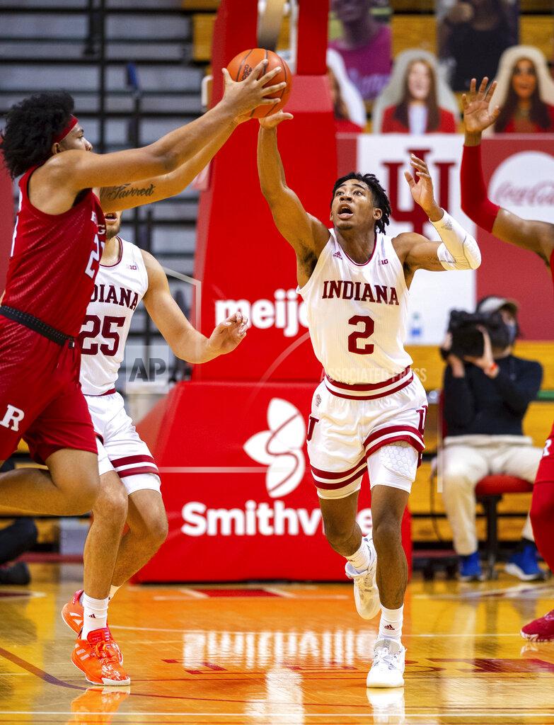 Doug Mcschooler Indiana guard Armaan Franklin (2) and Rutgers guard Ron Harper Jr. (24) go after a long rebound during the second half of an NCAA college basketball game, Sunday, Jan. 24, 2021, in Bloomington, Ind. (AP Photo/Doug McSchooler)