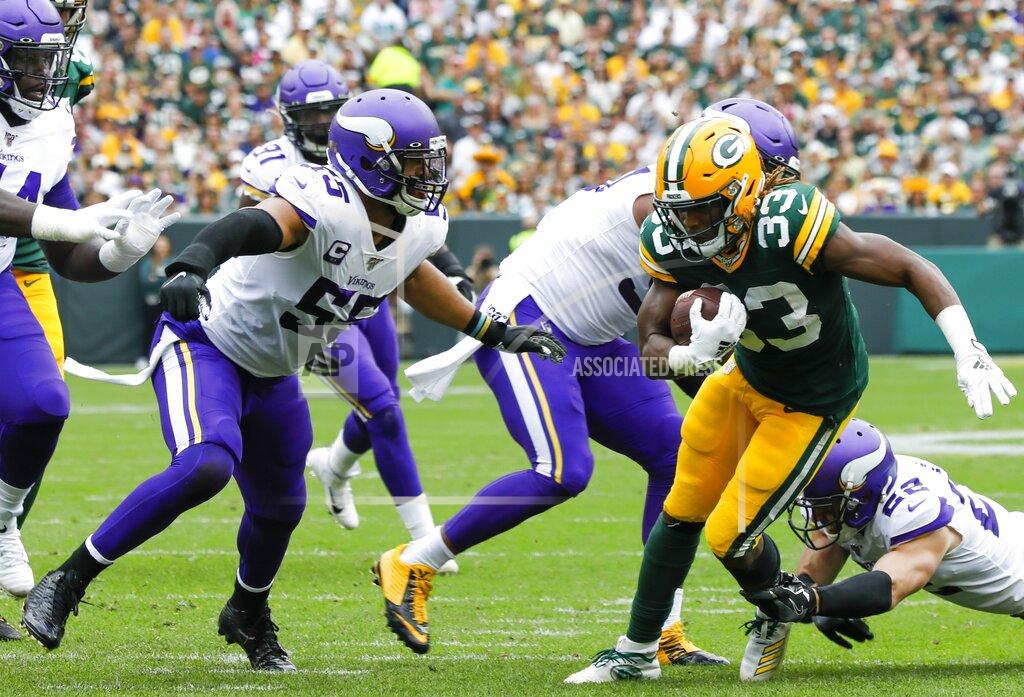 Mike Roemer Green Bay Packers' Aaron Jones runs during the first half of an NFL football game against the Minnesota Vikings Sunday, Sept. 15, 2019, in Green Bay, Wis. (AP Photo/Mike Roemer)