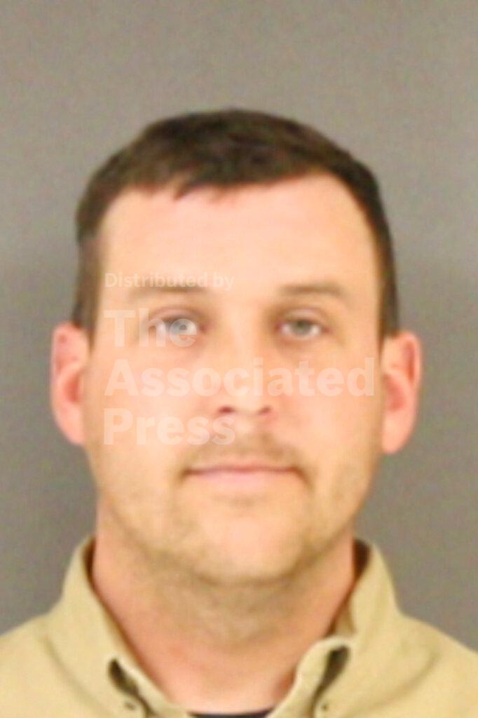 This Wednesday, Feb. 5, 2020, Hinds County Detention Center booking photograph shows former wrestler Brett DiBiase in Raymond, Miss. DiBiase and five other people were indicted and arrested for allegedly embezzling millions in federal money meant for the poor through an investigation by the Mississippi State Auditor's office. (Hinds County Detention Center via AP)