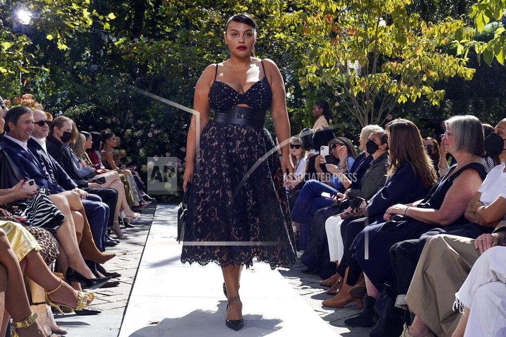 Richard Drew The Michael Kors Spring/Summer 2022 collection is modeled during Fashion Week in New York, Friday, Sept. 10, 2021. (AP Photo/Richard Drew)