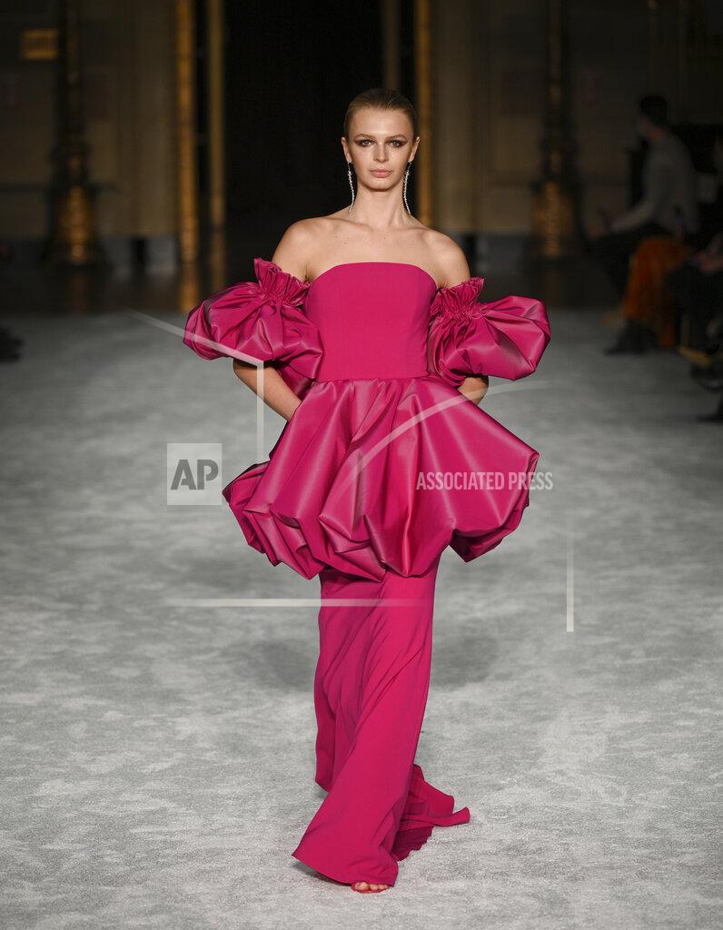 A model walks the runway at the Christian Siriano Fall/Winter 2021 at Gotham Hall during New York Fashion Week on Thursday, Feb. 25, 2021, in New York. (Photo by Evan Agostini/Invision/AP)