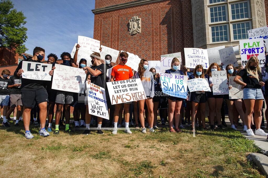 Olivia Sun Des Moines Public School students and supporters protest the cancellation of fall and winter extracurriculars on Sept. 7, 2020, in Des Moines, Iowa. All in-person activities were suspended this month as the district's classroom instruction remains virtual. (Olivia Sun/The Des Moines Register via AP)