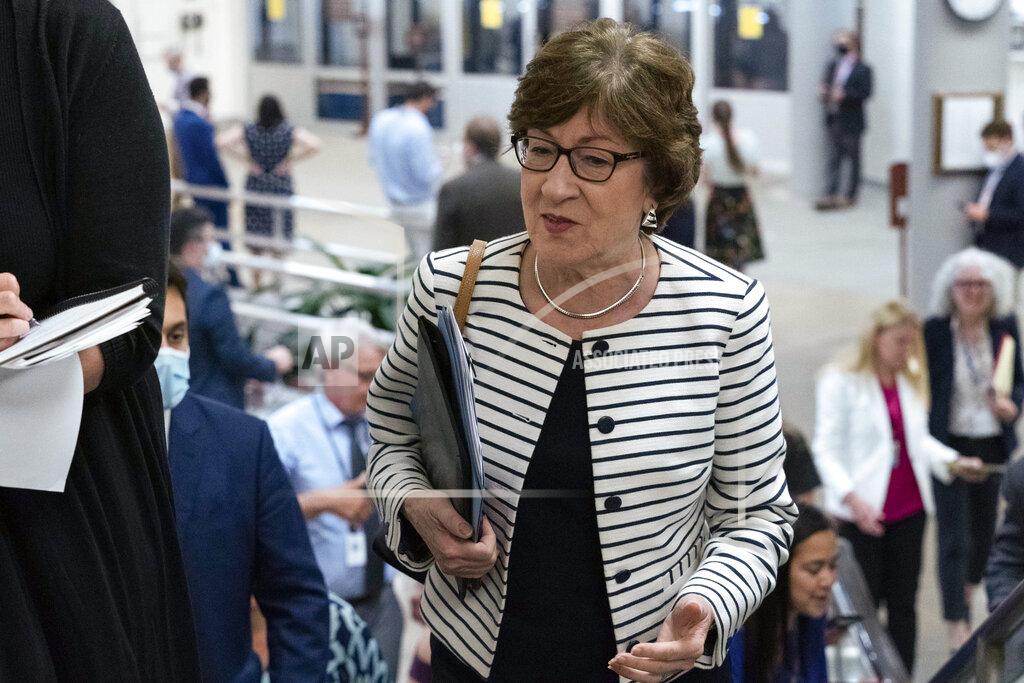 Jose Luis Magana Sen. Susan Collins, R-Maine, talks to reporters as she walks to the Senate chamber ahead of a test vote scheduled by Democratic Leader Chuck Schumer of New York on the bipartisan infrastructure deal senators brokered with President Joe Biden, on Capitol Hill, in Washington, Wednesday, July 21, 2021. Republicans prepared to block the vote by mounting a filibuster over what they see as a rushed and misguided process. (AP Photo/Jose Luis Magana)