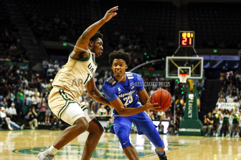Butch Dill Memphis guard Jayden Hardaway (25) drives to the basket around UAB forward Will Butler (12) during the first half of an NCAA college basketball game Saturday, Dec. 7, 2019, in Birmingham, Ala. (AP Photo/Butch Dill)