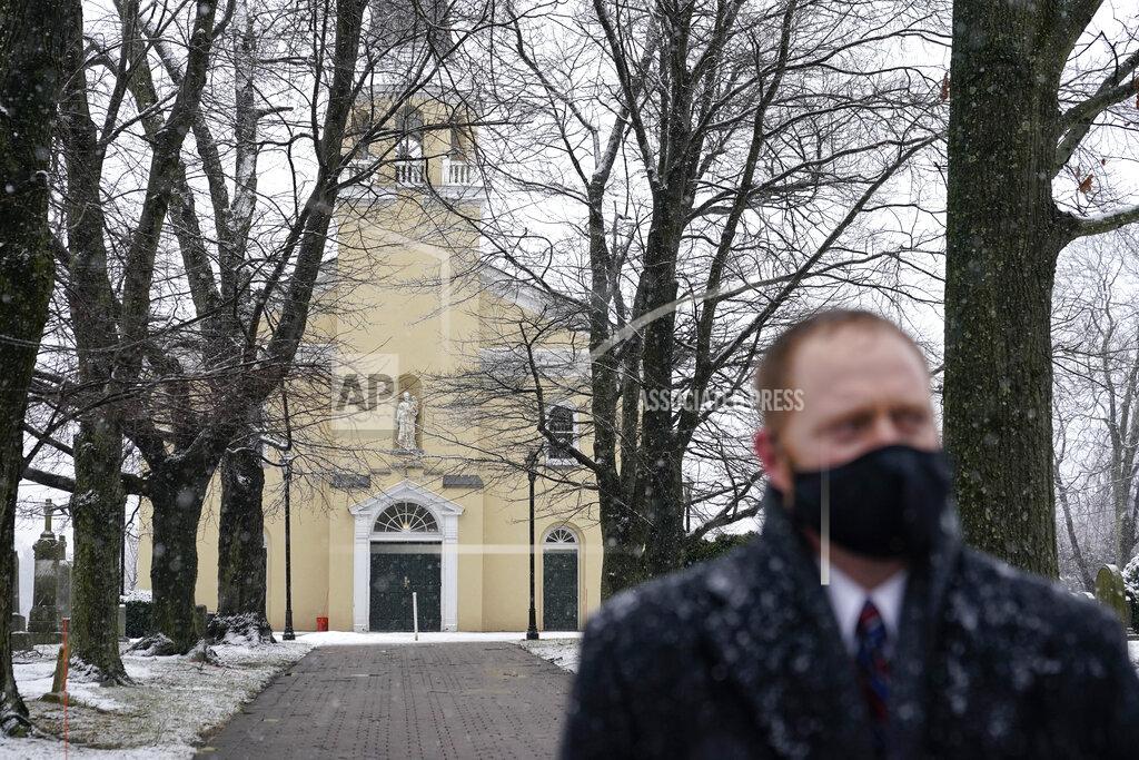 Patrick Semansky FILE - In this Feb. 7, 2021, file photo a member of the U.S. Secret Service stands guard outside St. Joseph on the Brandywine Catholic Church as President Joe Biden attends Mass in Wilmington, Del. For President Joe Biden, there's no place like a weekend home in Delaware. Since taking office, he has spent this weekend and several others in his adopted home state. (AP Photo/Patrick Semansky, File)