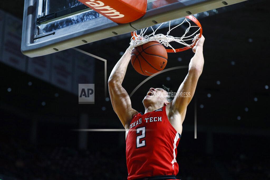 Charlie Neibergall Texas Tech guard Clarence Nadolny dunks the ball during the second half of an NCAA college basketball game against Iowa State, Saturday, Feb. 22, 2020, in Ames, Iowa. Texas Tech won 87-57. (AP Photo/Charlie Neibergall)