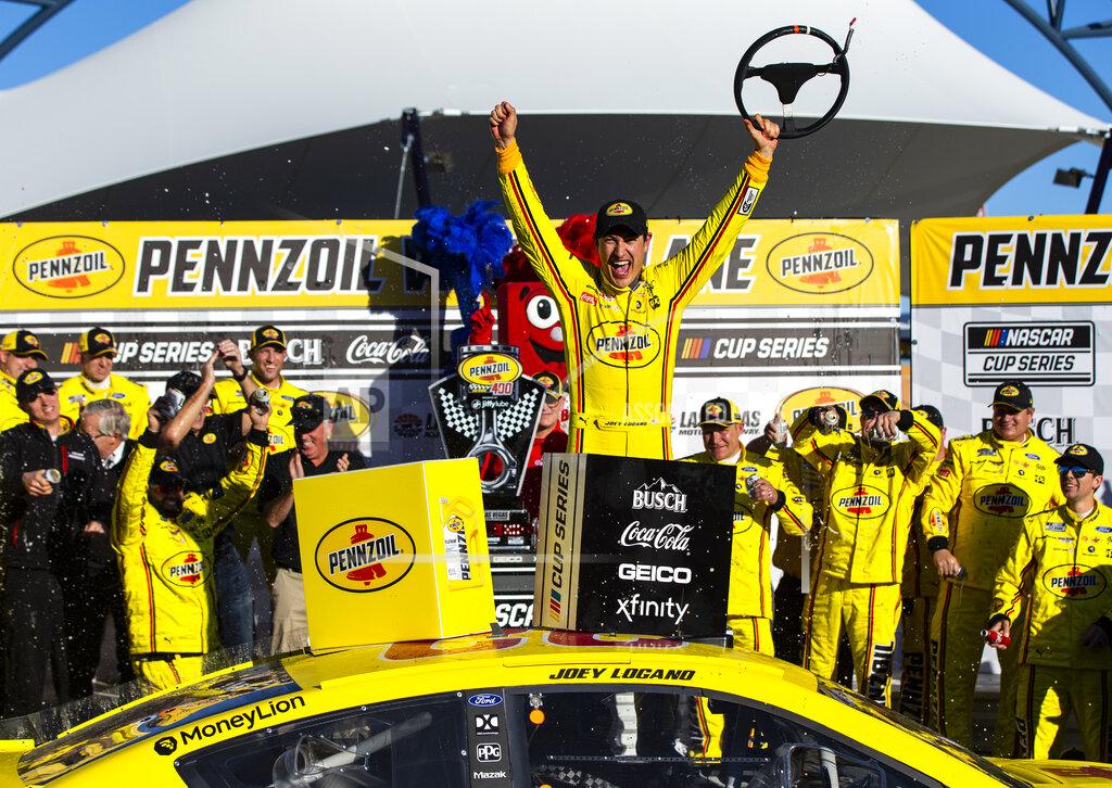 Chase Stevens Joey Logano celebrates after winning a NASCAR Cup Series auto race at the Las Vegas Motor Speedway on Sunday, Feb. 23, 2020. (AP Photo/Chase Stevens)