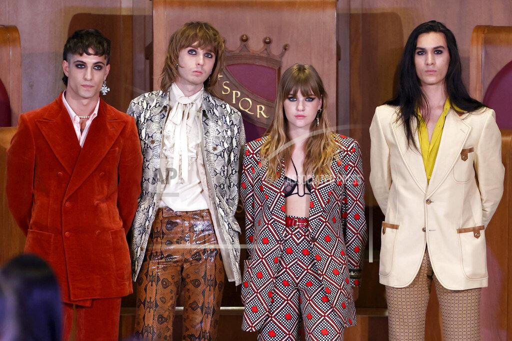 Riccardo De Luca embers of the Maneskin band, from left, Damiano David, Thomas Raggi, Victoria De Angelis and Ethan Torchio attend a ceremony to be awarded the Lupa Capitolina (She-wolf Capitoline) award, in Rome's city hall Campidoglio, Tuesday, July 27, 2021. The Italian band from Rome won the Eurovision 2021 song contest. (AP Photo/Riccardo De Luca)