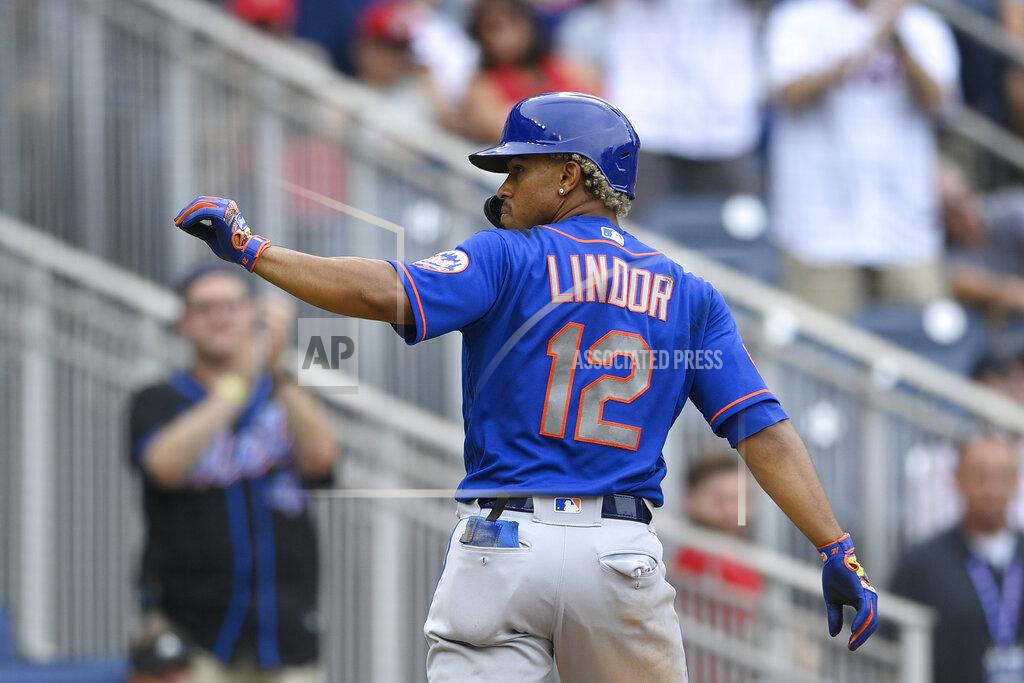 Nick Wass New York Mets' Francisco Lindor gestures toward the stands after he score on his home run during the ninth inning of a baseball game against the Washington Nationals, Sunday, Sept. 5, 2021, in Washington. (AP Photo/Nick Wass)
