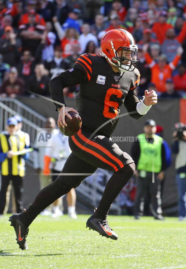 Ron Schwane Cleveland Browns quarterback Baker Mayfield rushes for a 10-yard touchdown during the first half of an NFL football game against the Seattle Seahawks, Sunday, Oct. 13, 2019, in Cleveland. (AP Photo/Ron Schwane)