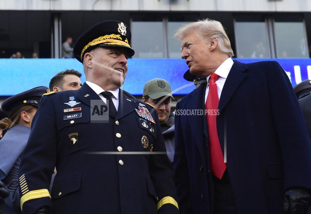 Susan Walsh President Donald Trump, right, talks with Army Chief of Staff Gen. Mark Milley, left, during the Army-Navy NCAA college football game in Philadelphia, Saturday, Dec. 8, 2018. Trump announced that Milley will be the next chairman of the Joint Chiefs of Staff. (AP Photo/Susan Walsh)