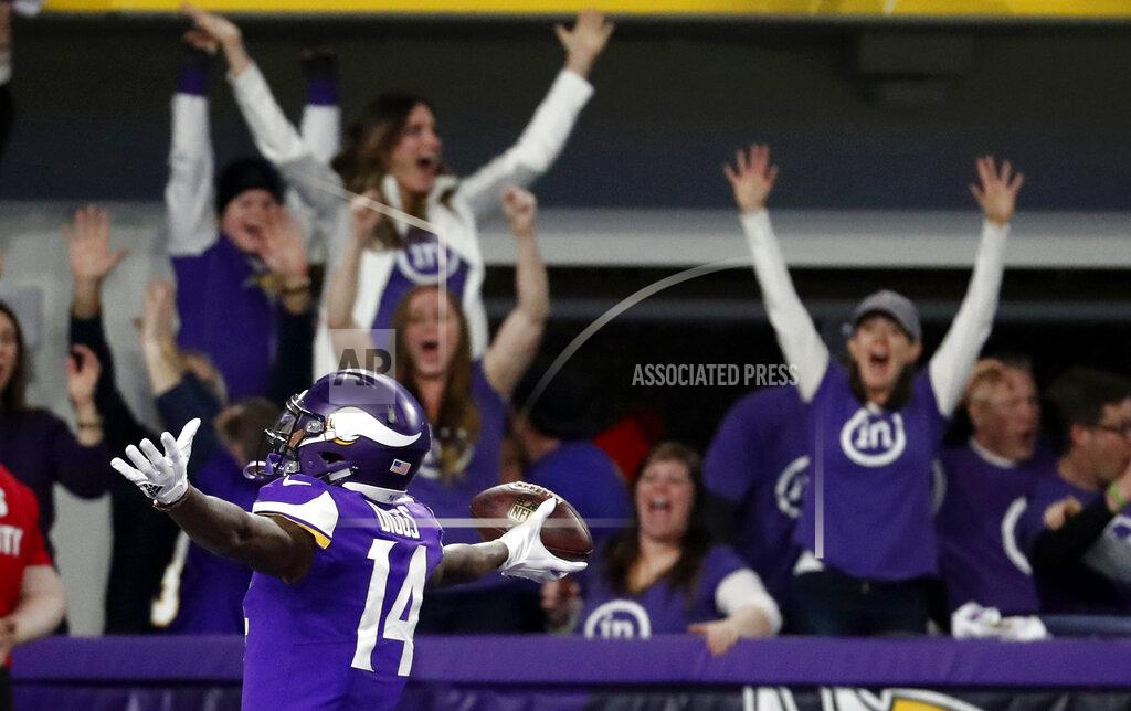 Jeff Roberson FILE - In this Jan. 14, 2018, file photo, Minnesota Vikings wide receiver Stefon Diggs (14) celebrates in the end zone after a making the game-winning touchdown against the New Orleans Saints late in the second half of an NFL divisional football playoff game in Minneapolis. This Sunday's wild-card round meeting between Minnesota and New Orleans in the Superdome will be the third playoff meeting in the past decade between the teams. (AP Photo/Jeff Roberson, File)
