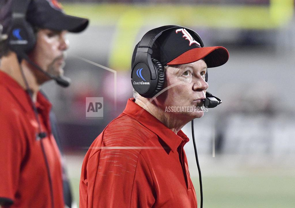 Timothy D. Easley Louisville head coach Bobby Petrino watches a replay on the video board during the second half of an NCAA college football game against Georgia Tech, Friday, Oct. 5, 2018, in Louisville, Ky. Georgia Tech won 66-31. (AP Photo/Timothy D. Easley)
