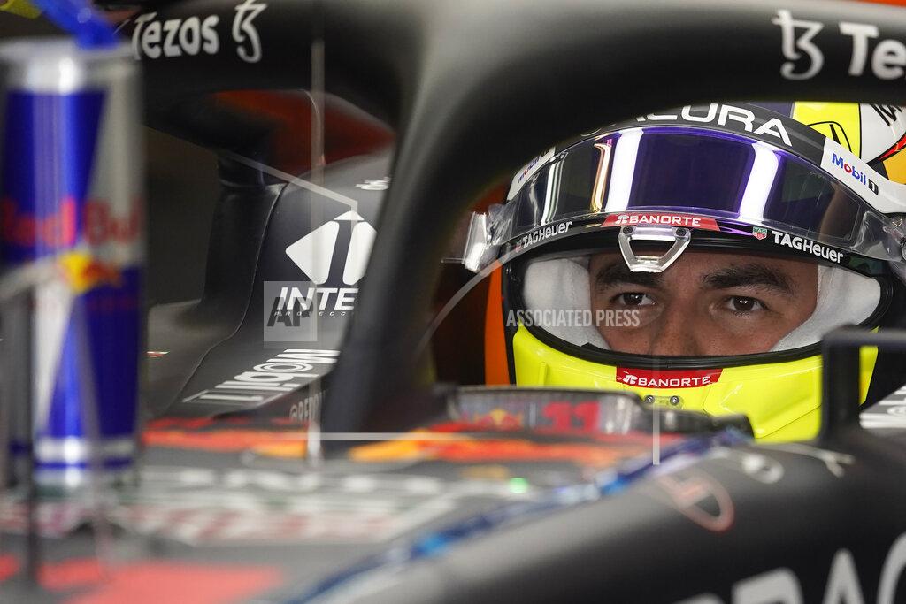Darron Cummings Red Bull driver Sergio Perez, of Mexico, waits in his car during a practice session for the F1 US Grand Prix auto race at the Circuit of the Americas, Friday, Oct. 22, 2021, in Austin, Texas. (AP Photo/Darron Cummings)