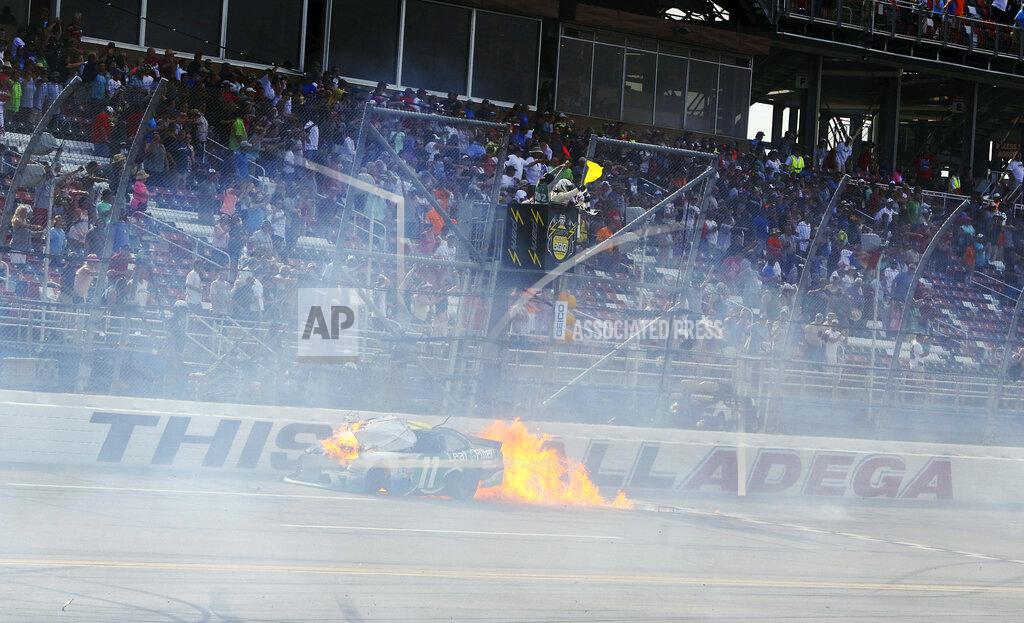 Jay Alley FILE - In this April 30, 2016, file photo, flames come from Blake Koch's car after a wreck just before the finish of the NASCAR Xfinity Series auto race at Talladega Superspeedway, in Talladega, Ala. The ever-present air of unpredictability at Talladega Superspeedway is even more pronounced than usual this weekend, with NASCAR having replaced the horsepower-sapping restrictor plates.(AP Photo/Jay Alley, File)